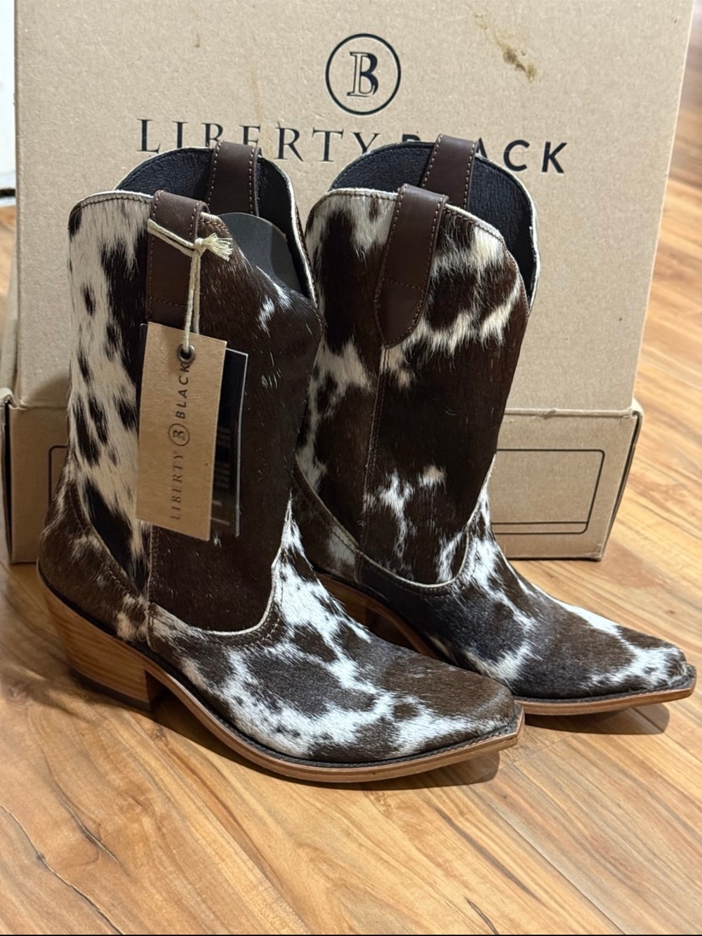 LIBERTY Black Brown & White Hair-On Cowhide Western Ankle Boots